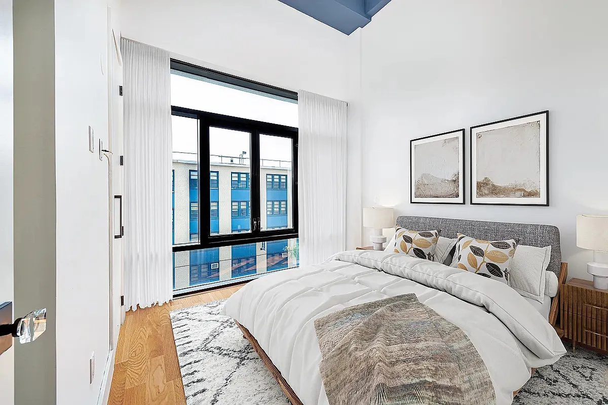 30 Starr Street, Unit 4B Brooklyn, NY 11221 - Photo 4 of 5 a bedroom with a large bed and a window