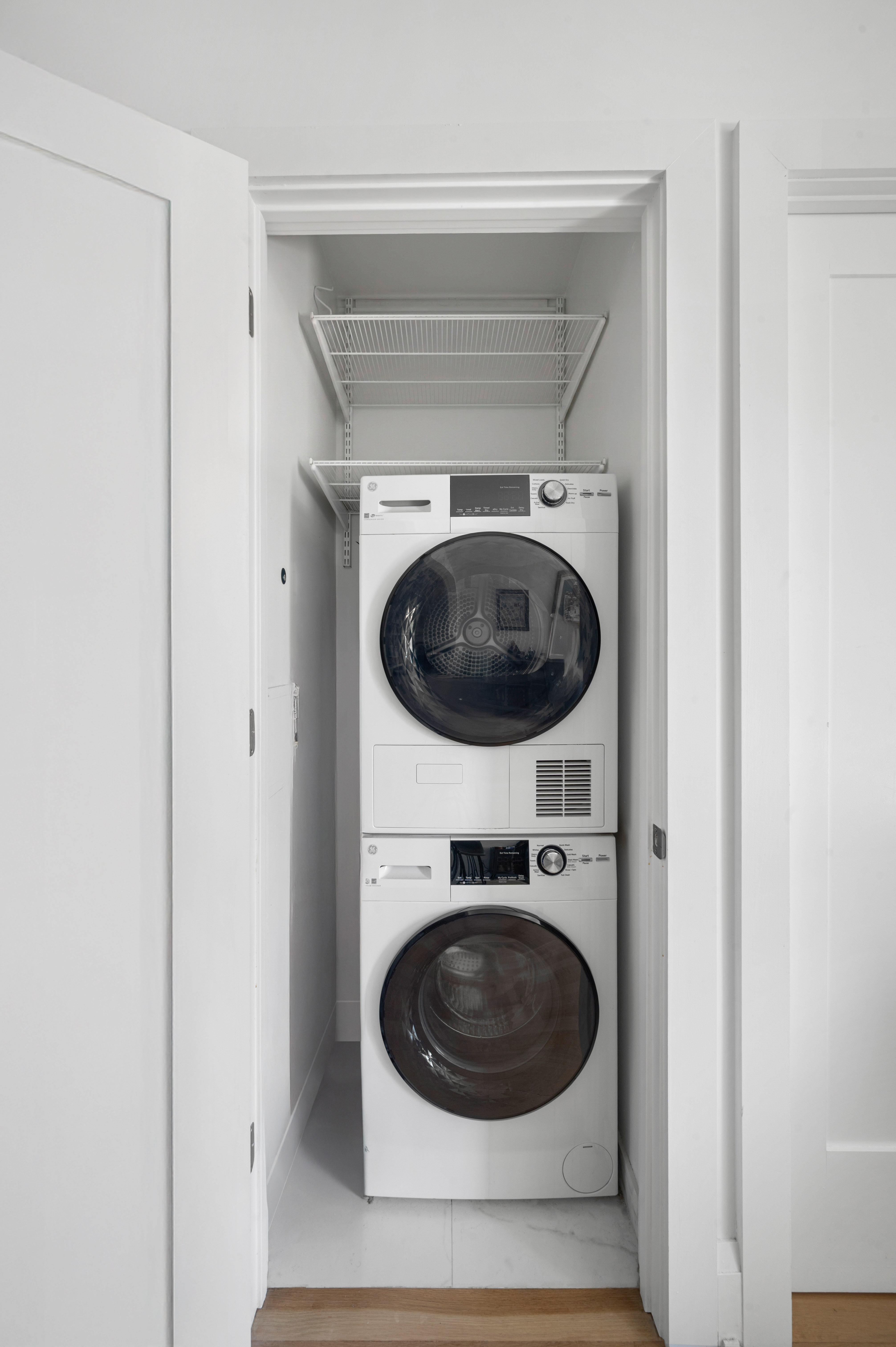23-43 31st Road, Unit 3C Queens, NY 11106 - Photo 6 of 10 a utility room with dryer and washer