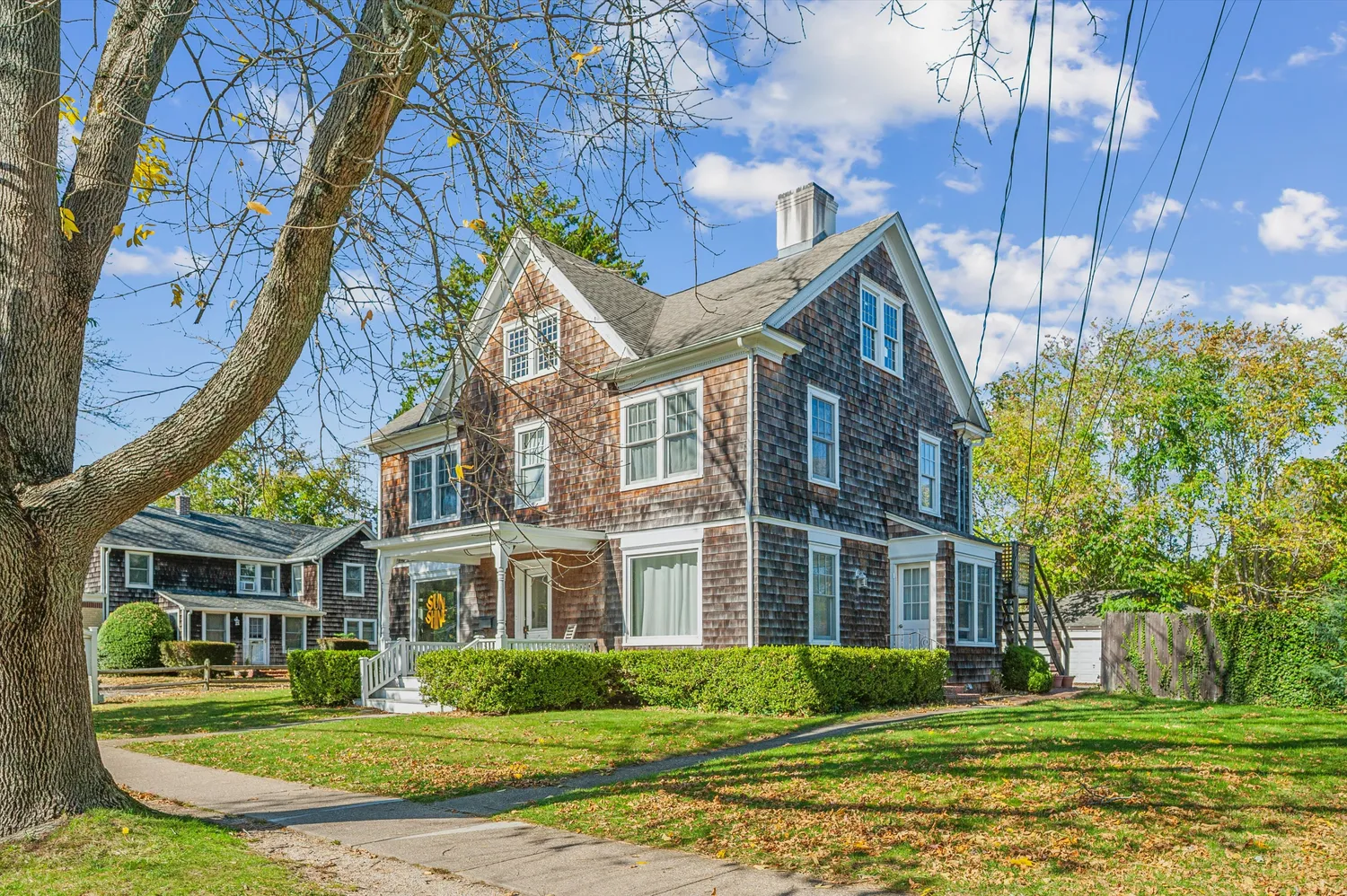 front view of a house with a yard