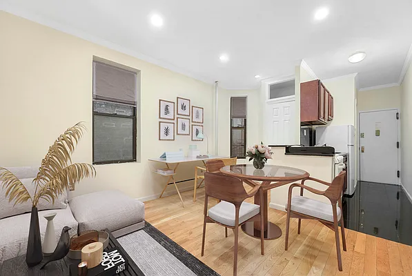 370 Columbus Avenue, Unit 4E Manhattan, NY 10024 - Photo 2 of 11 a view of a dining room with furniture