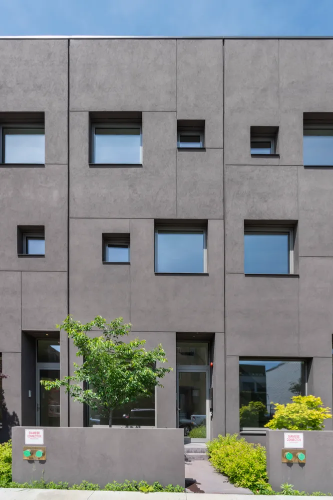 a black and white photo of a living room
