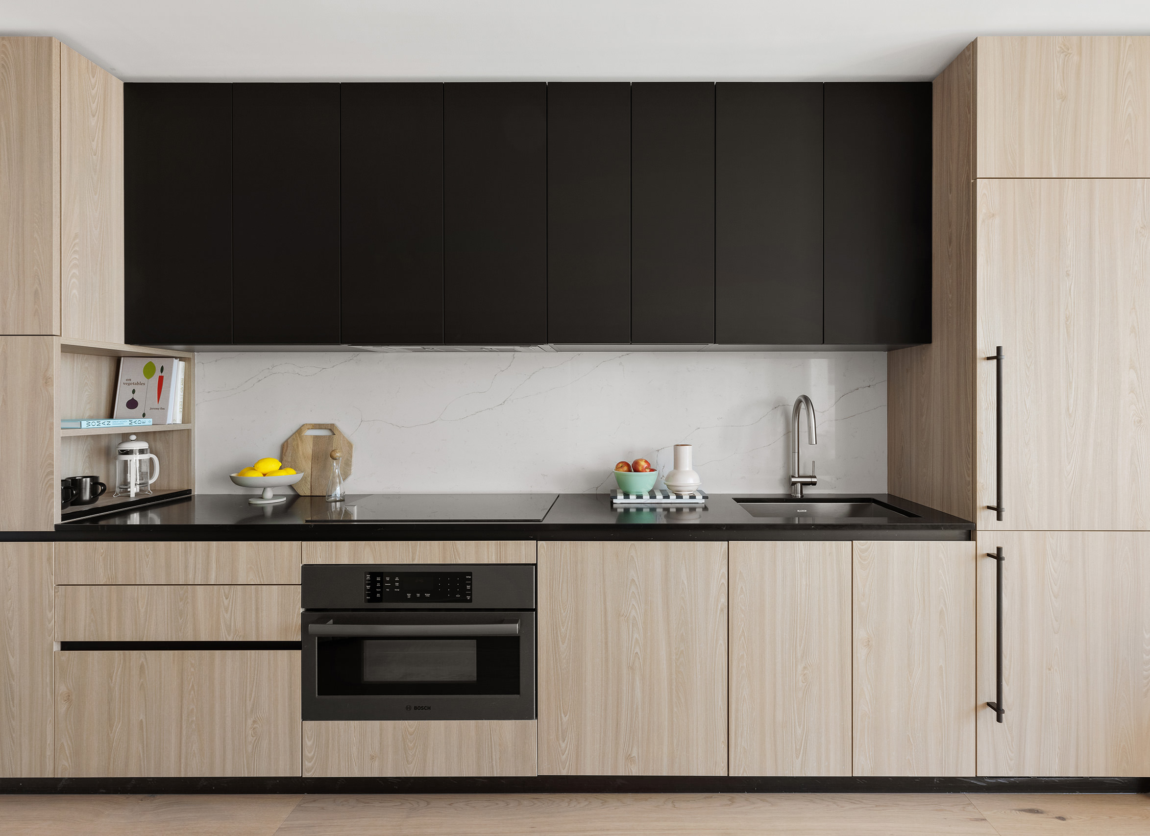312 West 43rd Street, Unit 31H Manhattan, NY 10036 - Photo 3 of 11 a kitchen with a sink and cabinets