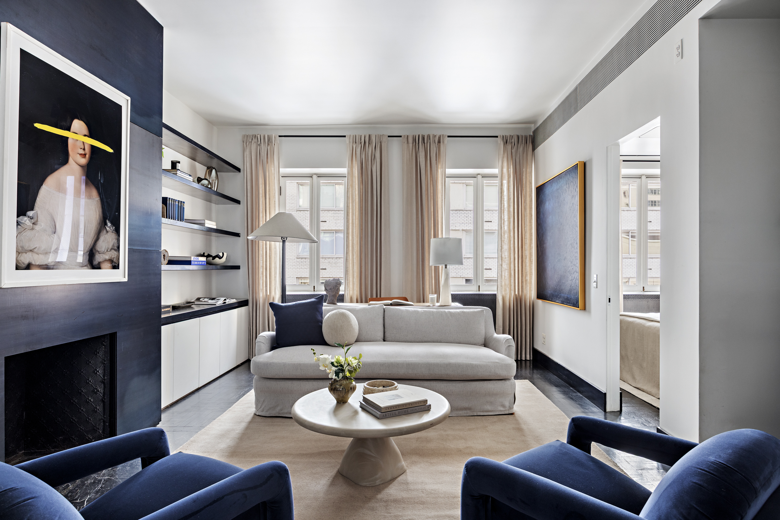15 East 70th Street, Unit PHB Manhattan, NY 10021 - Photo 23 of 35 a living room with furniture and a fireplace