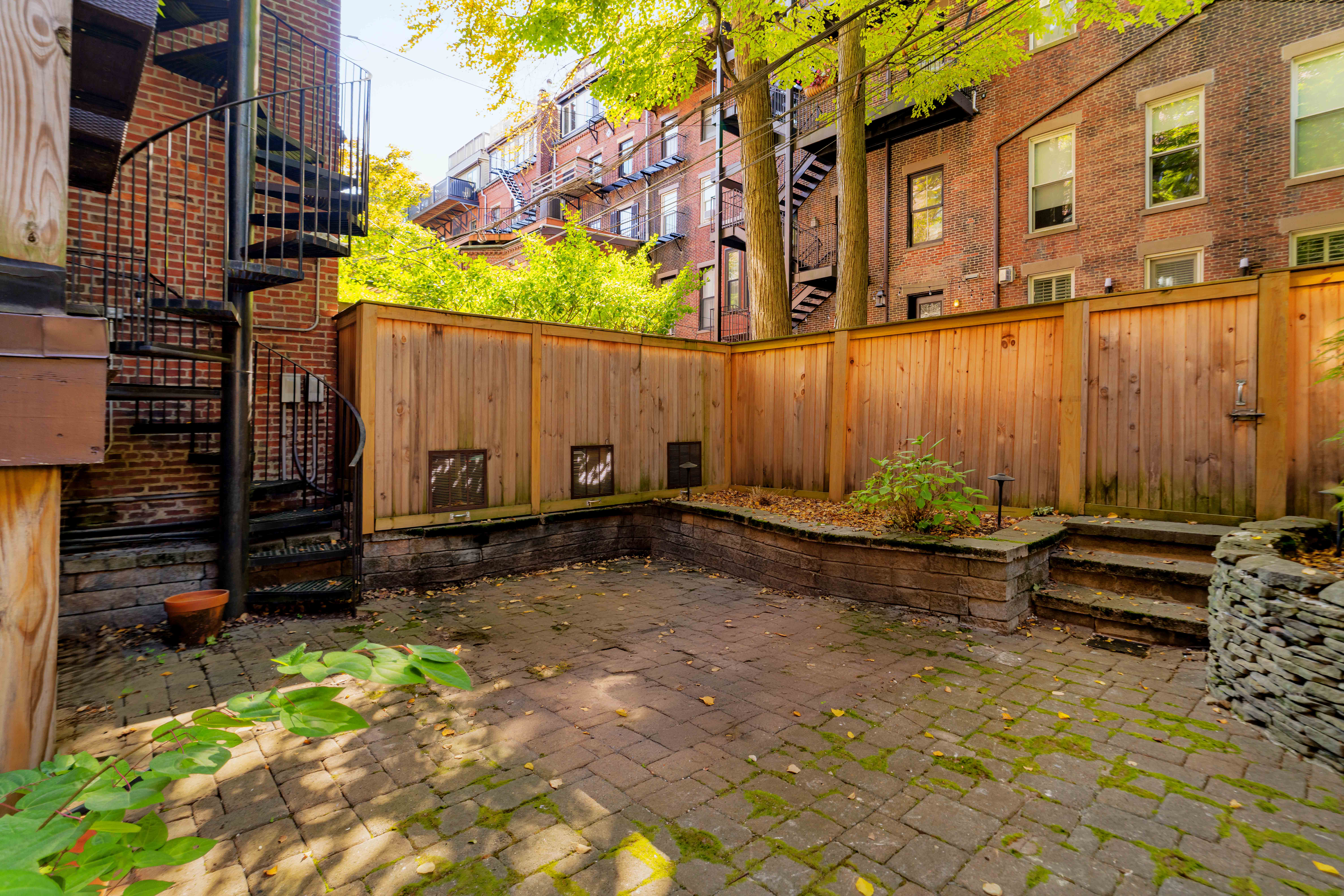 92 Waltham Street, Unit 1A Boston, MA 02118 - Photo 7 of 18 a view of a backyard