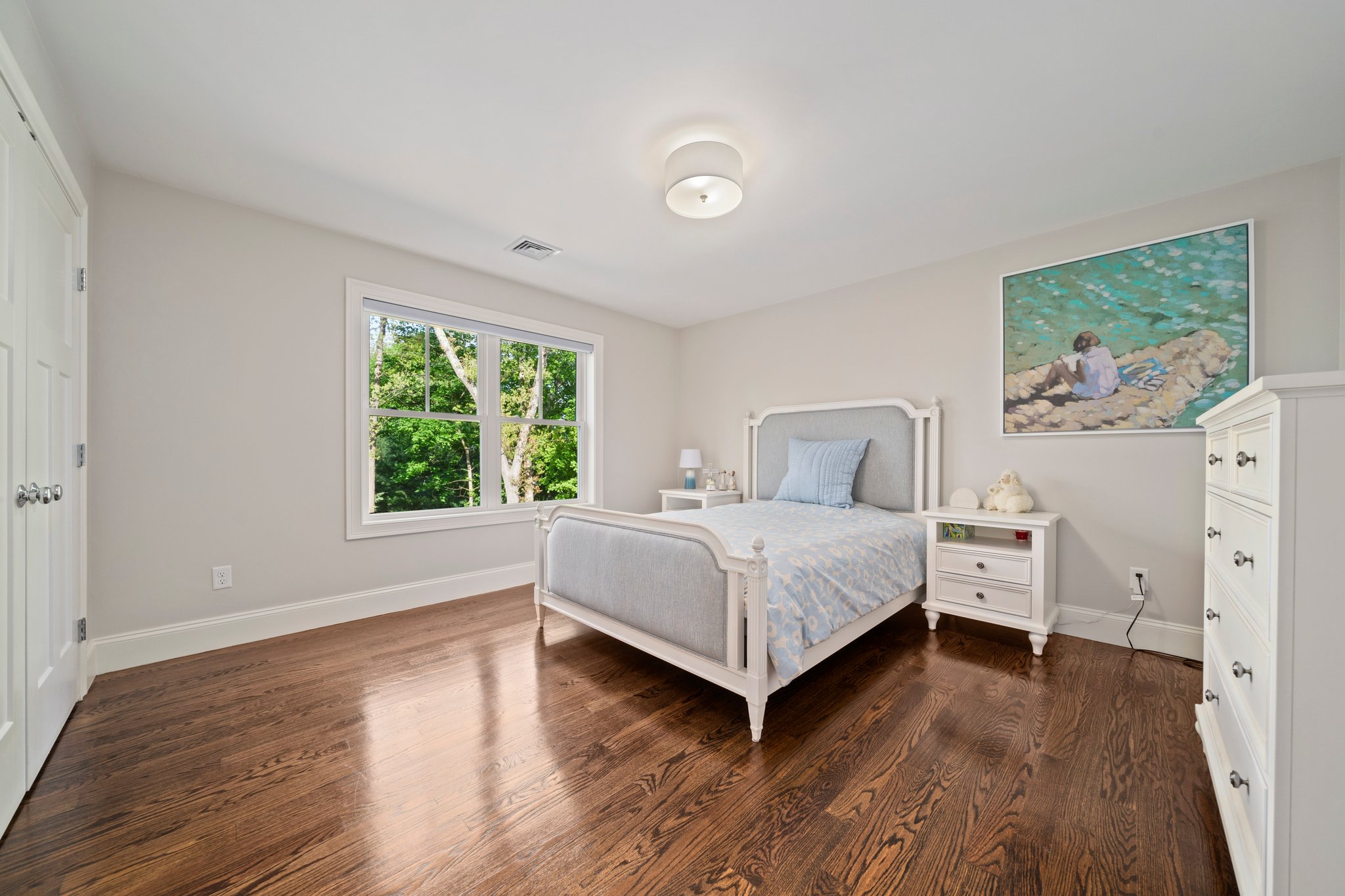 241 Lowell Road Wellesley, MA 02481 - Photo 32 of 85 a bedroom with a bed and a window