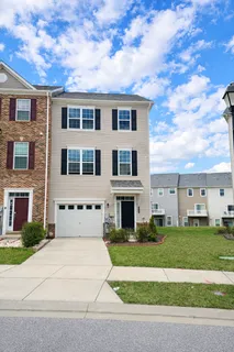 a front view of building with yard