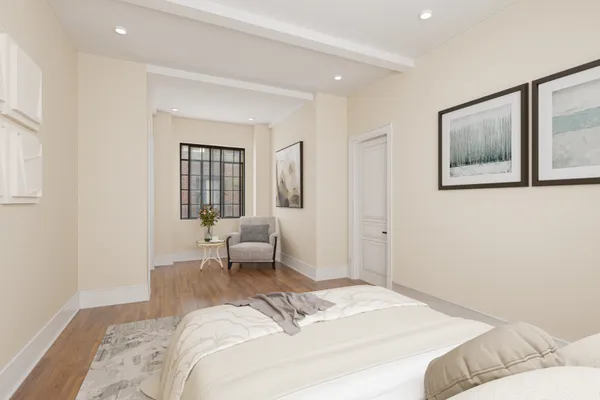 a bedroom with a bed and furniture