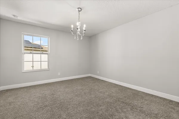 a view of a livingroom with furniture