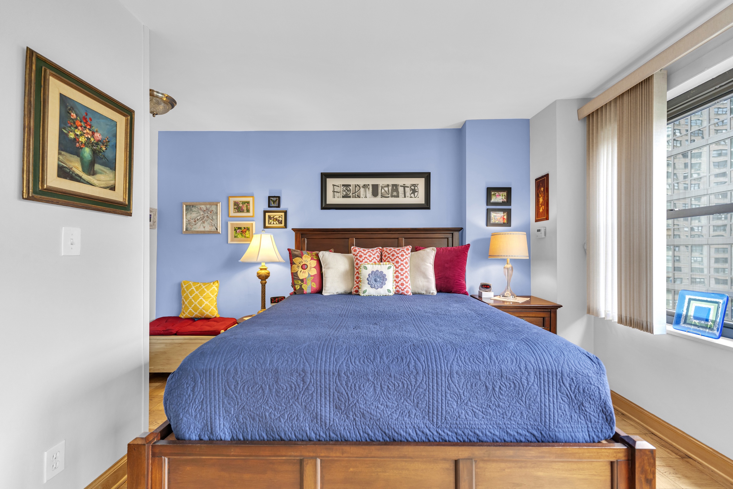 180 West End Avenue, Unit 9P Manhattan, NY 10023 - Photo 5 of 13 a bedroom with a bed and painting on the wall