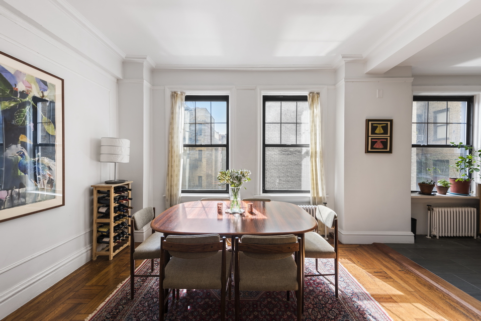 170 2nd Avenue, Unit 5E Manhattan, NY 10003 - Photo 2 of 10 a view of a dining room with furniture a rug and wooden floor