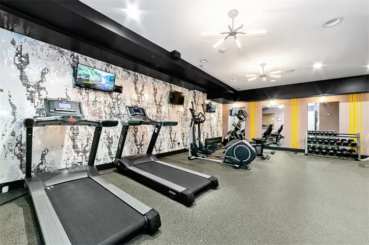 a view of a room with gym equipment