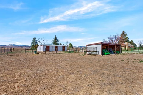 a view of a backyard with a garden