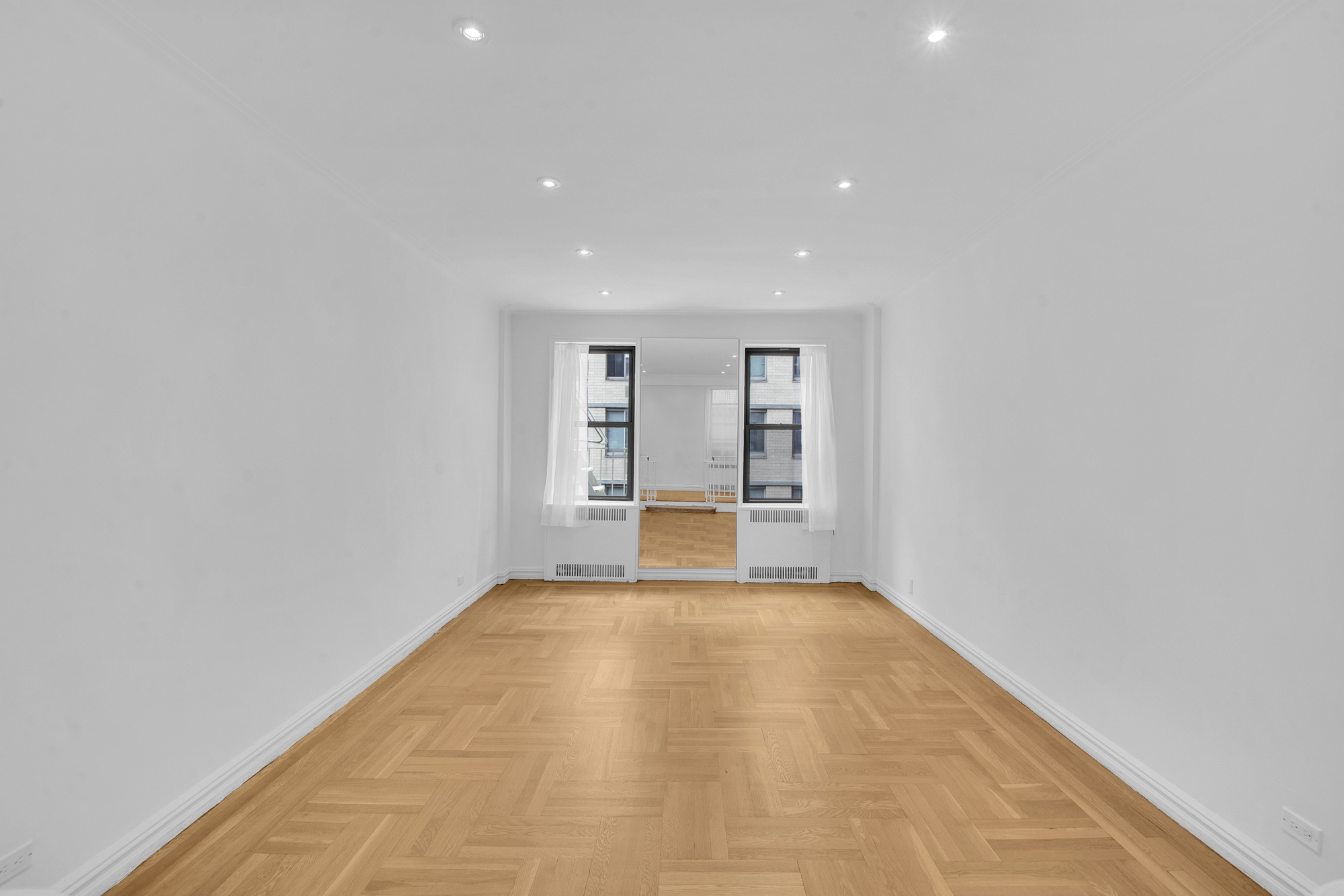 225 West 25th Street, Unit 5K Manhattan, NY 10001 - Photo 2 of 17 a view of an empty room with a window