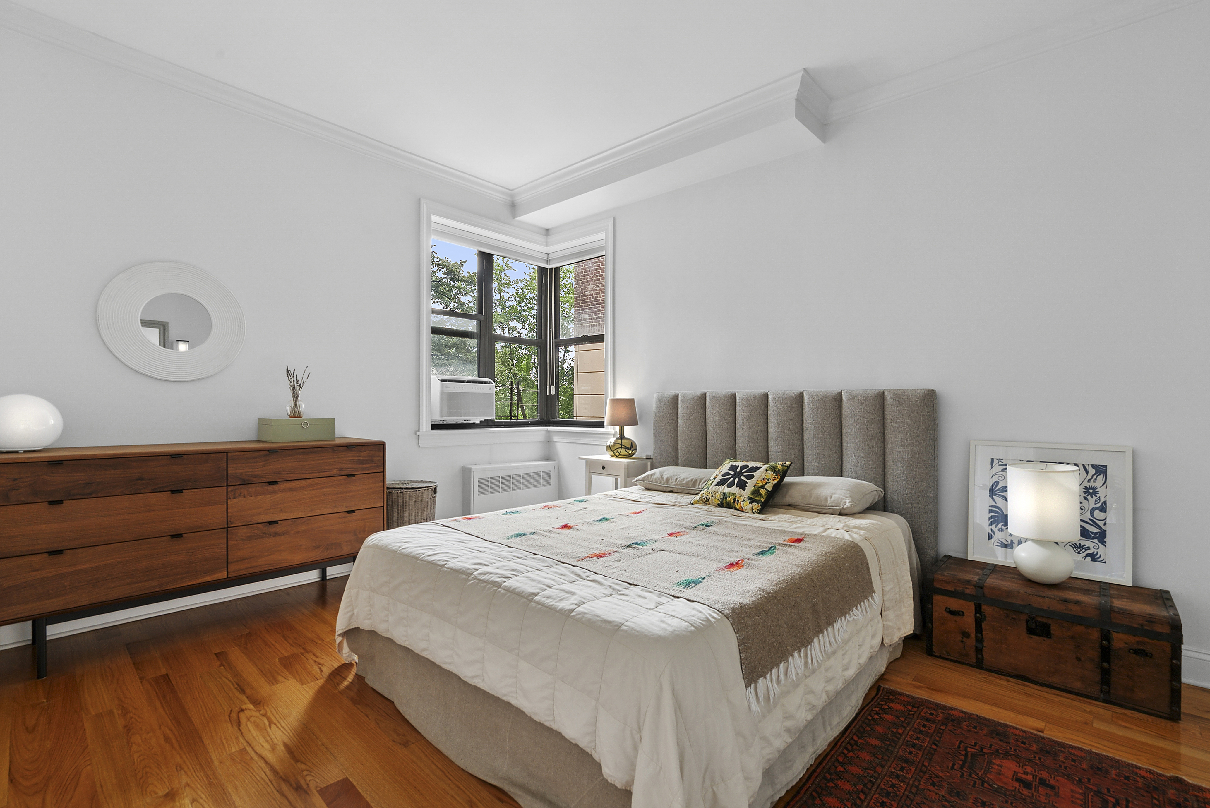 273 Bennett Avenue, Unit 3F Manhattan, NY 10040 - Photo 6 of 9 a bed room with a bed and a window