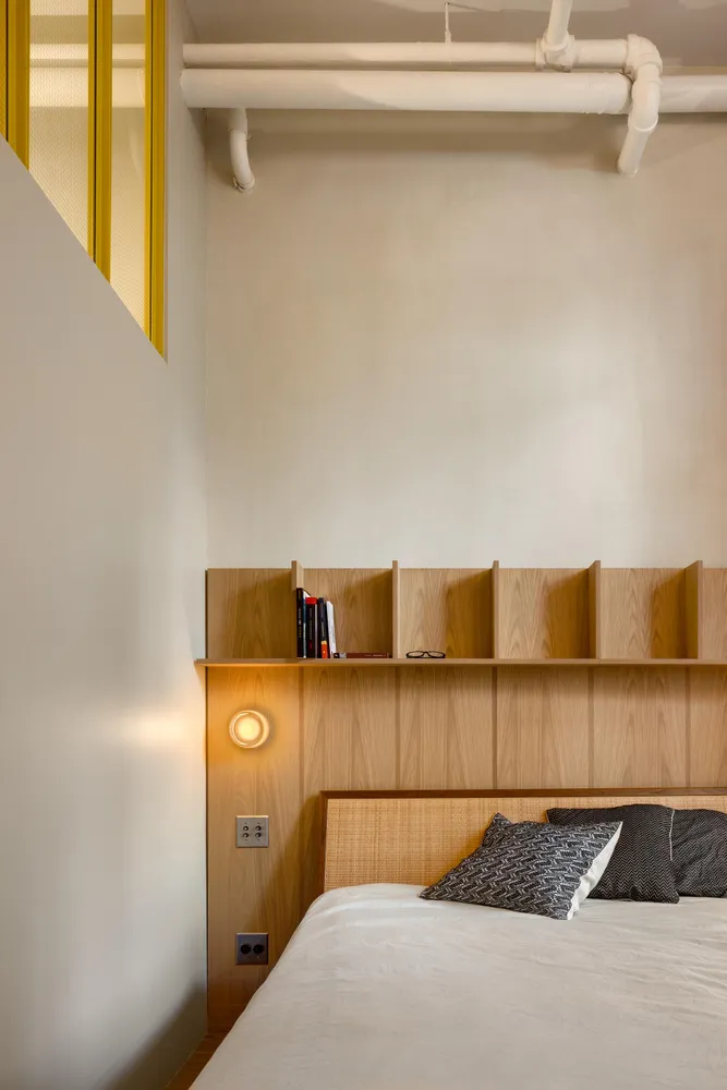 a bathroom with a sink mirror and a bathtub