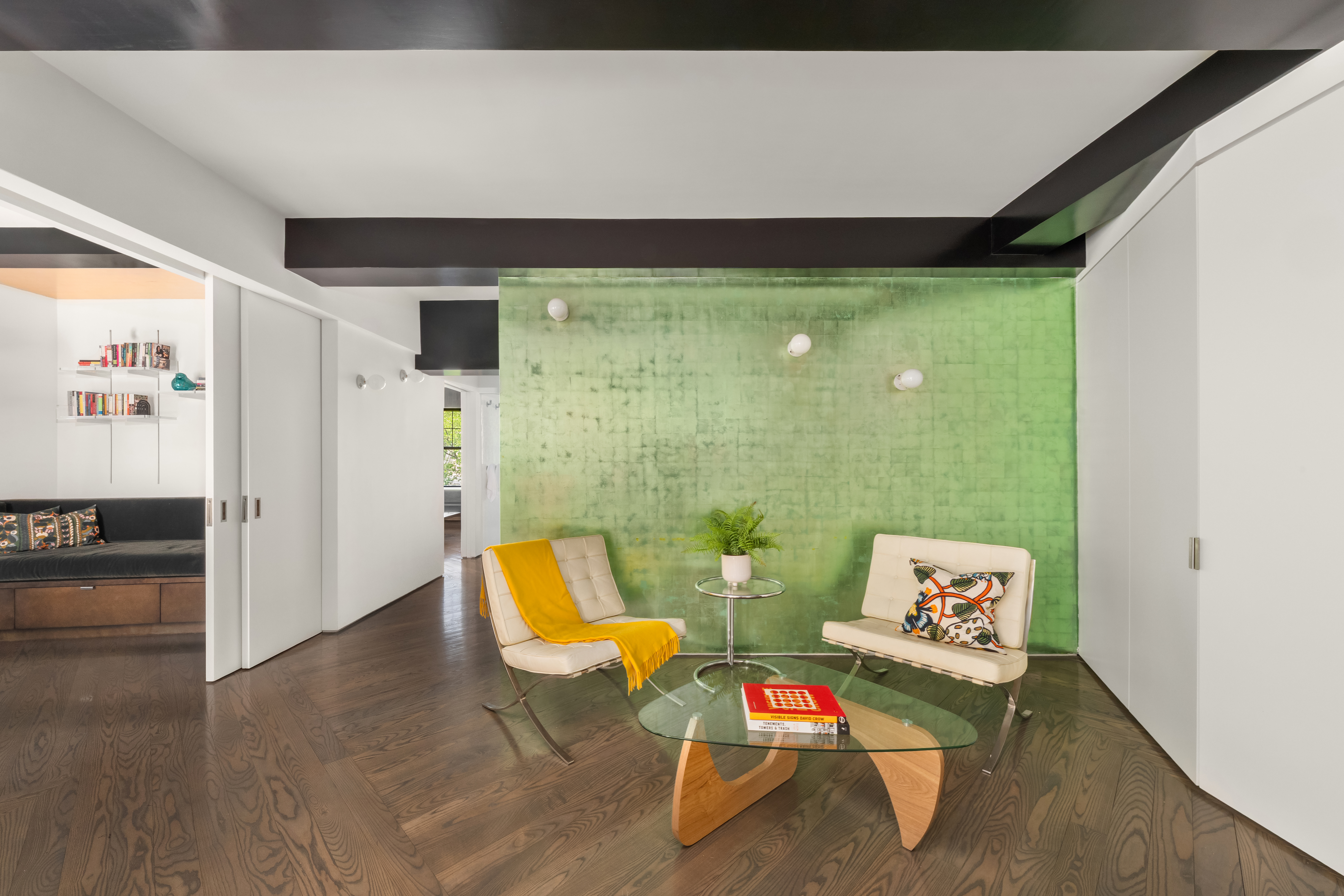 170 2nd Avenue, Unit 5A Manhattan, NY 10003 - Photo 2 of 12 a living room with furniture and a painting on the wall