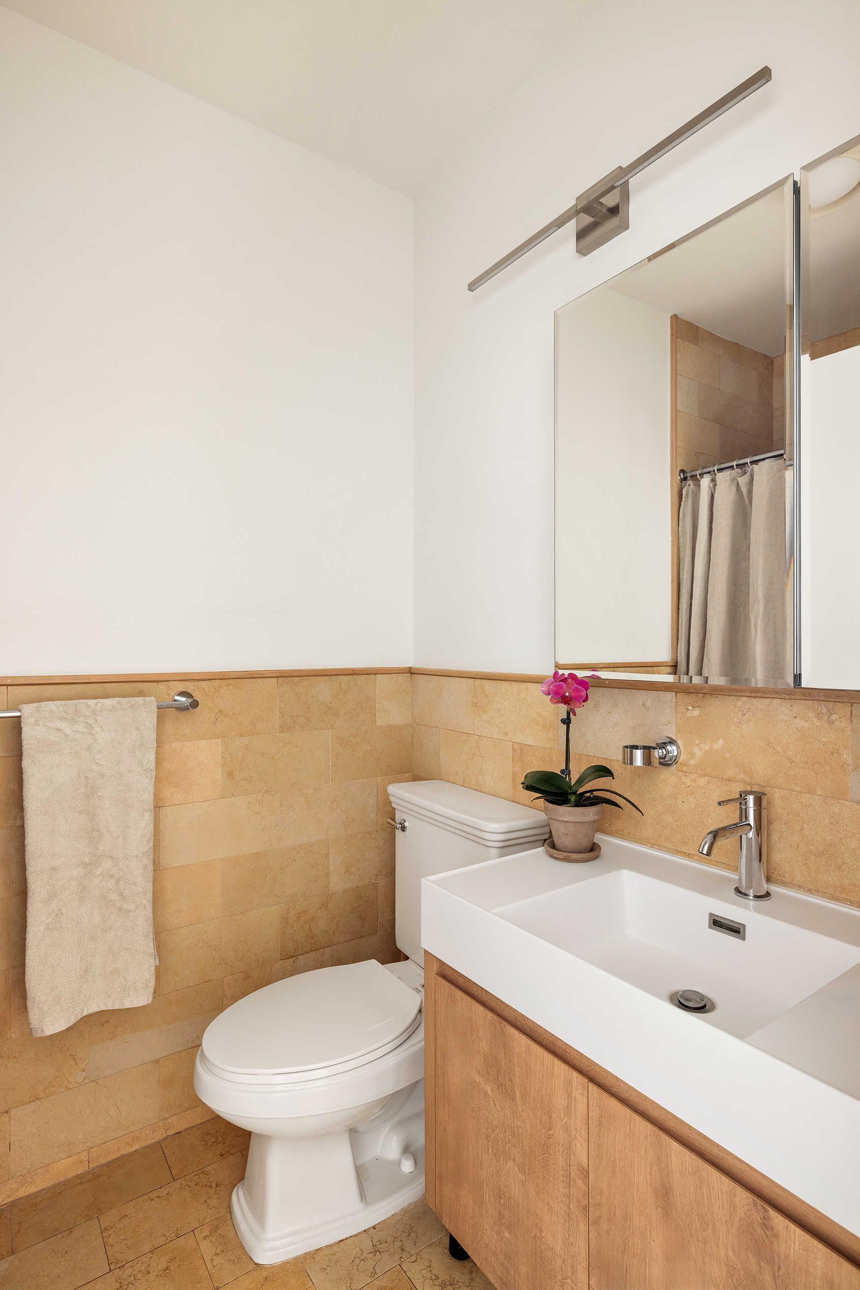 60 Tiffany Place, Unit 3G Brooklyn, NY 11231 - Photo 8 of 10 a bathroom with a sink and a toilet