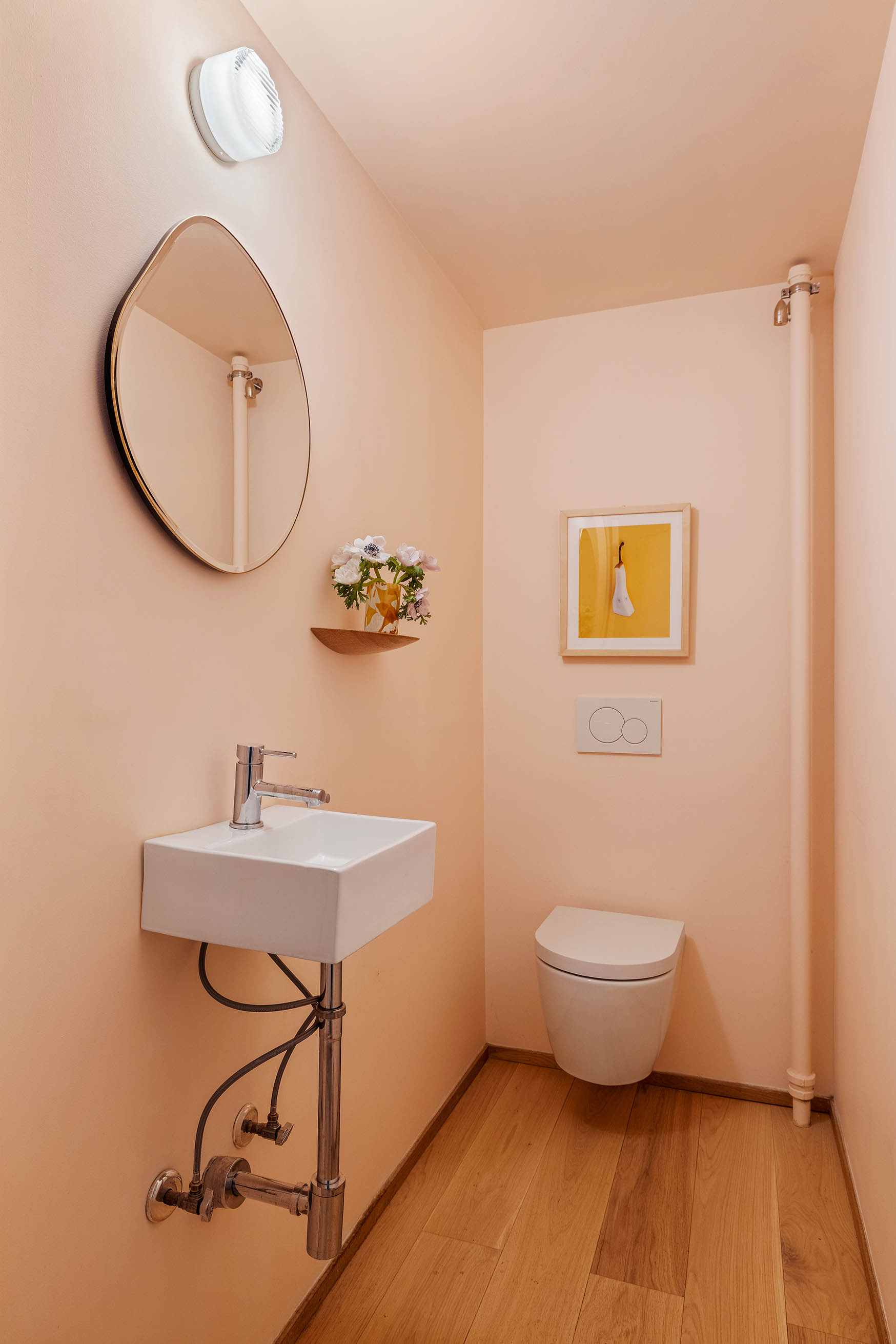 679 Putnam Avenue Brooklyn, NY 11221 - Photo 24 of 27 a bathroom with a sink mirror vanity and toilet