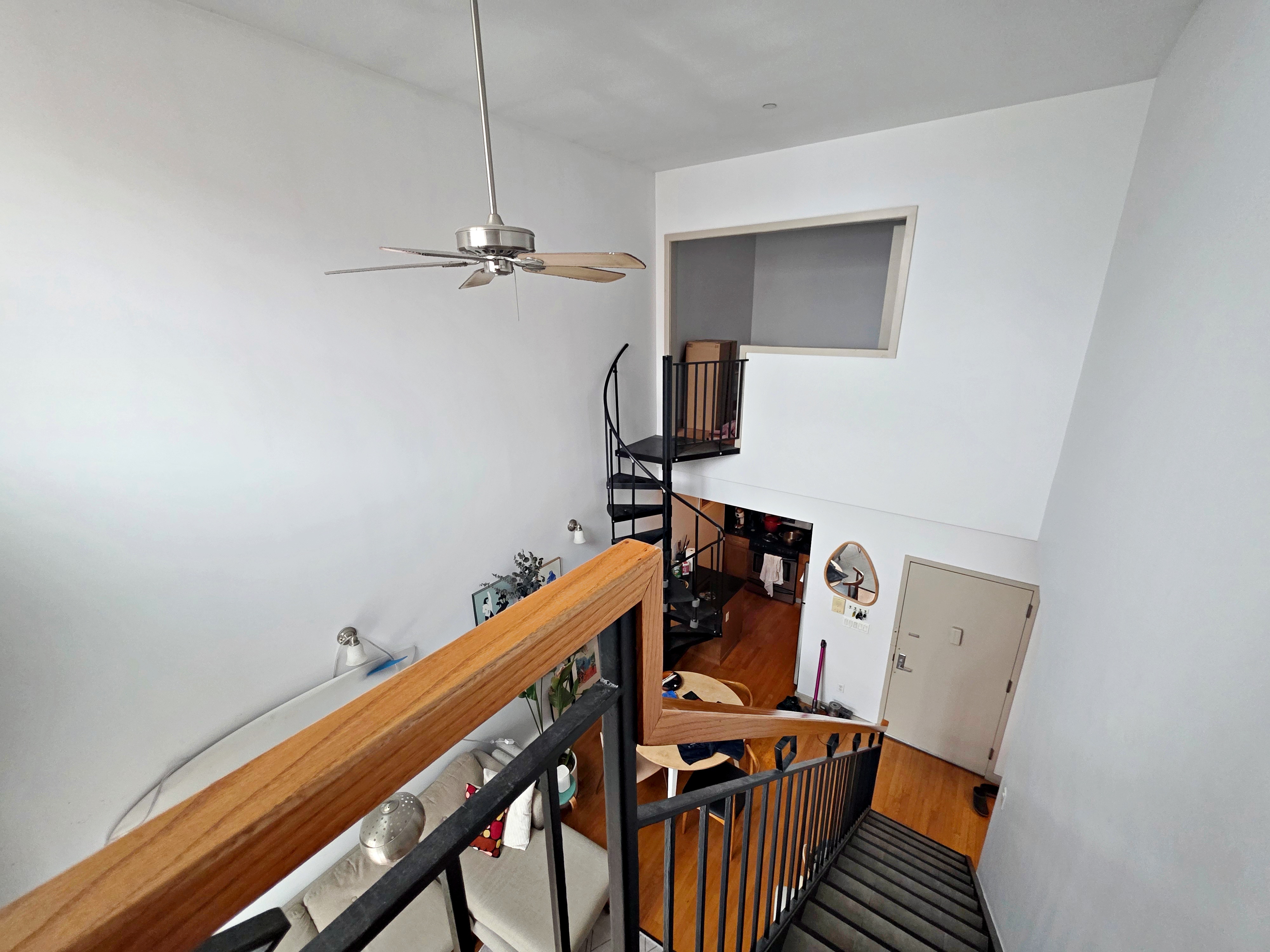713 Metropolitan Avenue, Unit 4R Brooklyn, NY 11211 - Photo 10 of 11 a view of a room with furniture and wooden floor