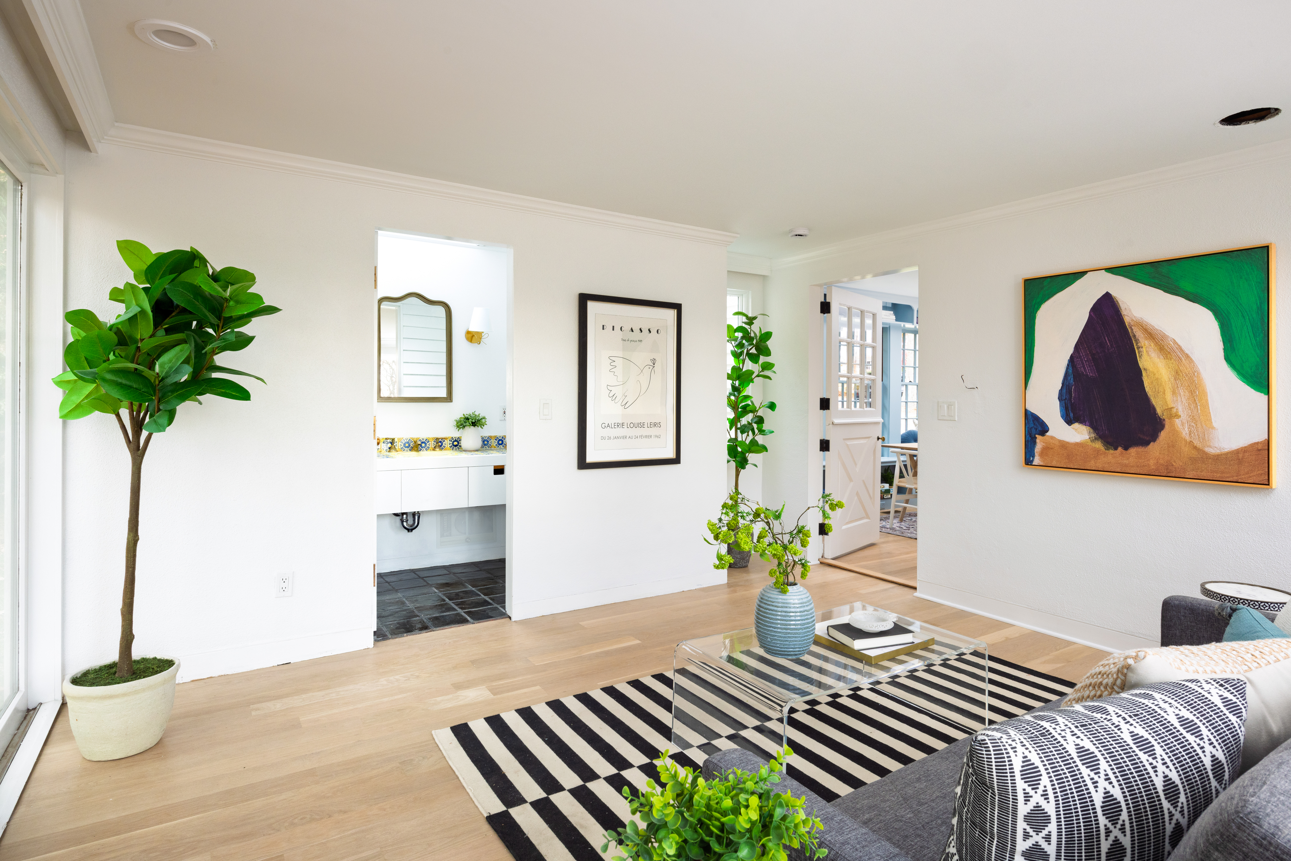 111 Beverly Road Brookline, MA 02467 - Photo 13 of 27 a bedroom with bed and a potted plant