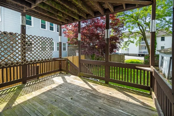 a view of porch with wooden floor