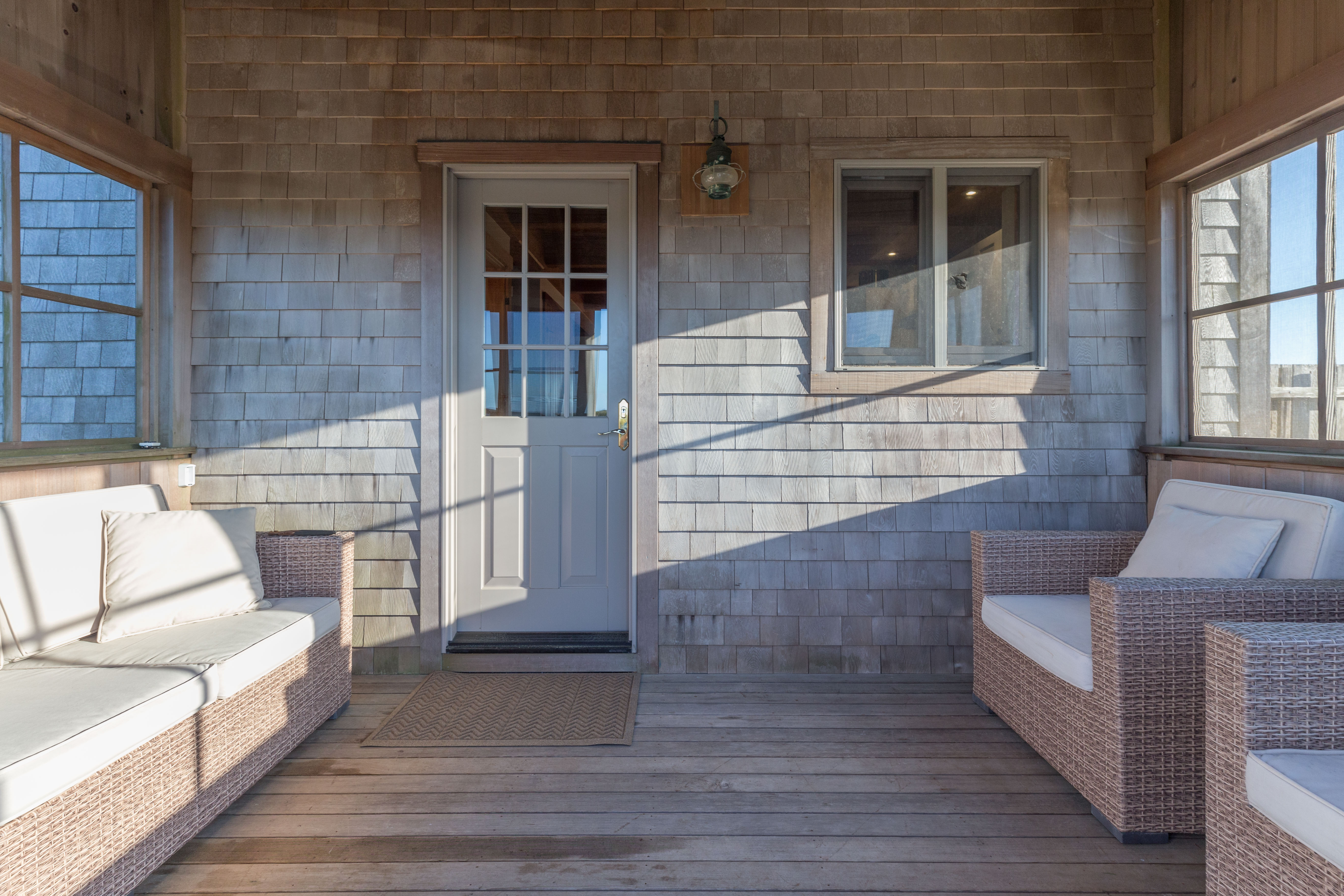65 Nobadeer Avenue Nantucket, MA 02554 - Photo 3 of 20 front view of a house with large windows