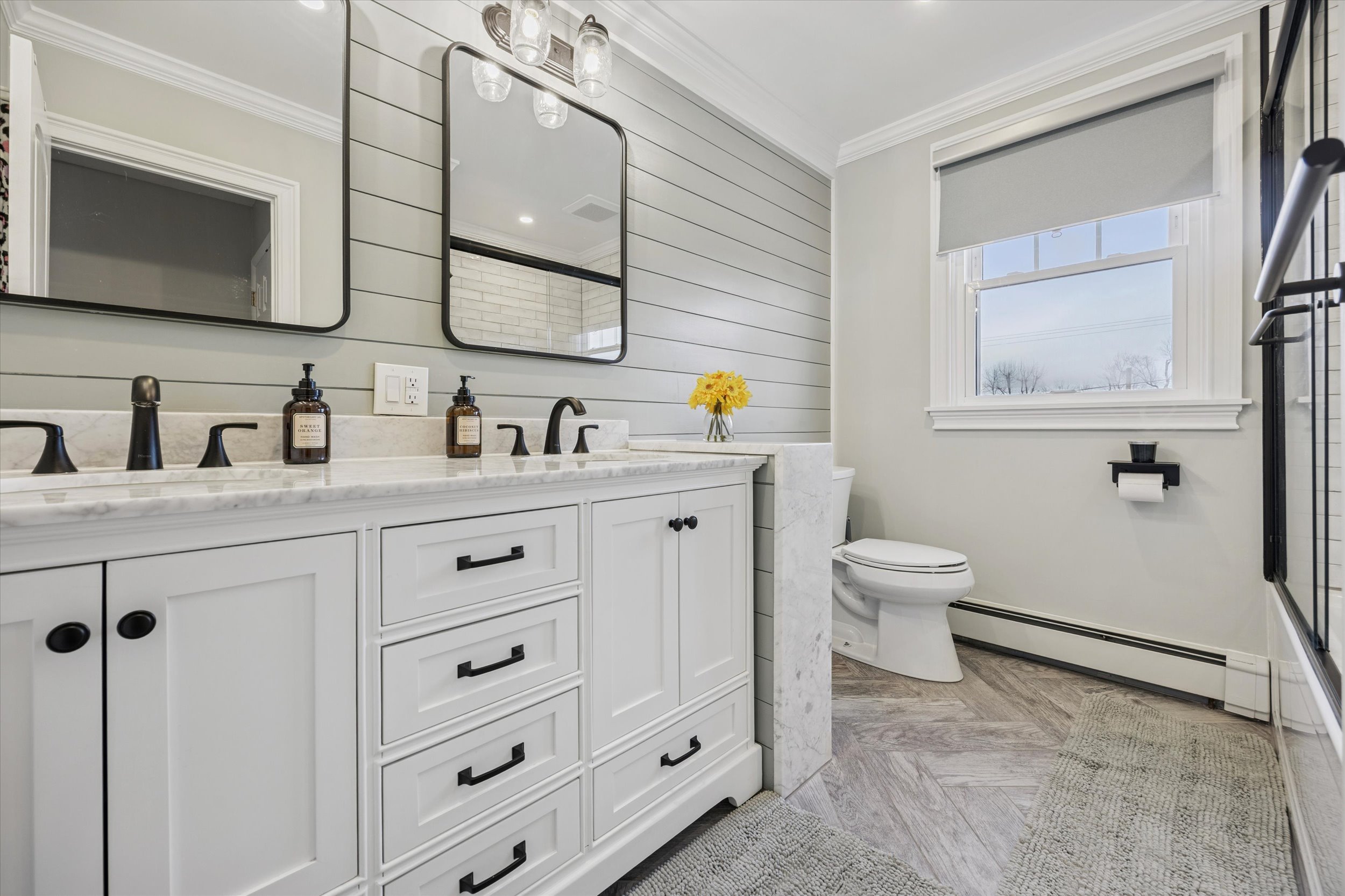 535 Bell Lane Ambler, PA 19002 - Photo 17 of 45 a bathroom with a toilet sink and mirror