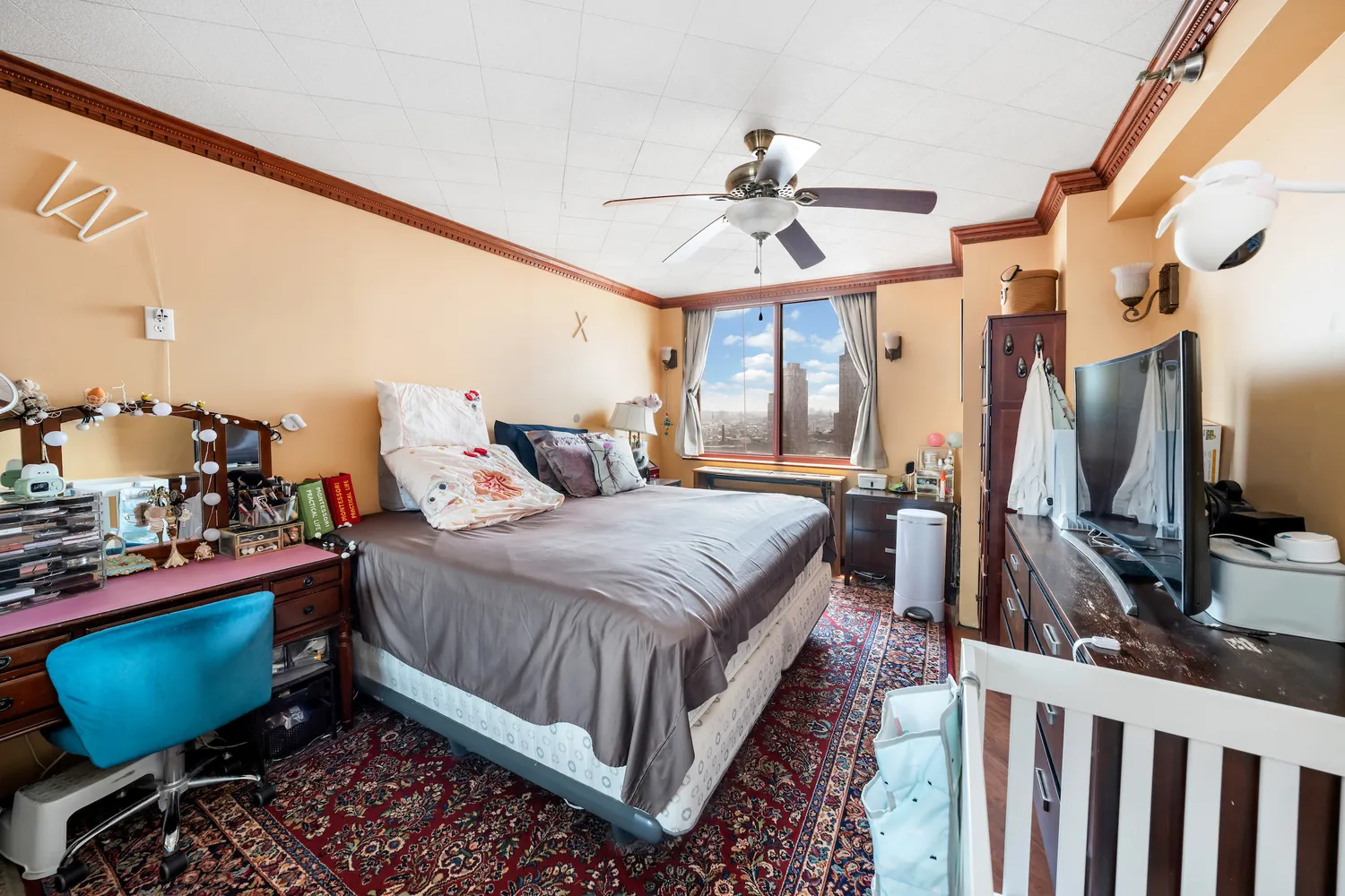 a bed room with a bed and a chair