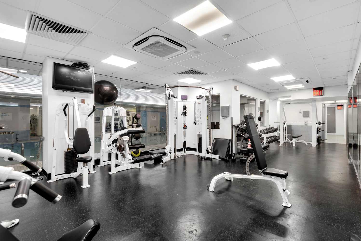250 East 40th Street, Unit 22B Manhattan, NY 10016 - Photo 12 of 13 a view of a room with gym equipment