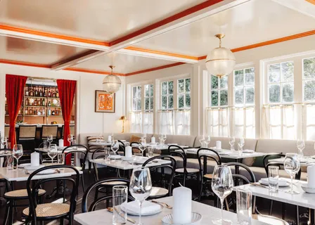 a very nice looking living room with a large window