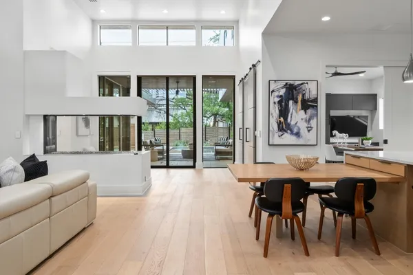 a view of a dining room with furniture window and outside view