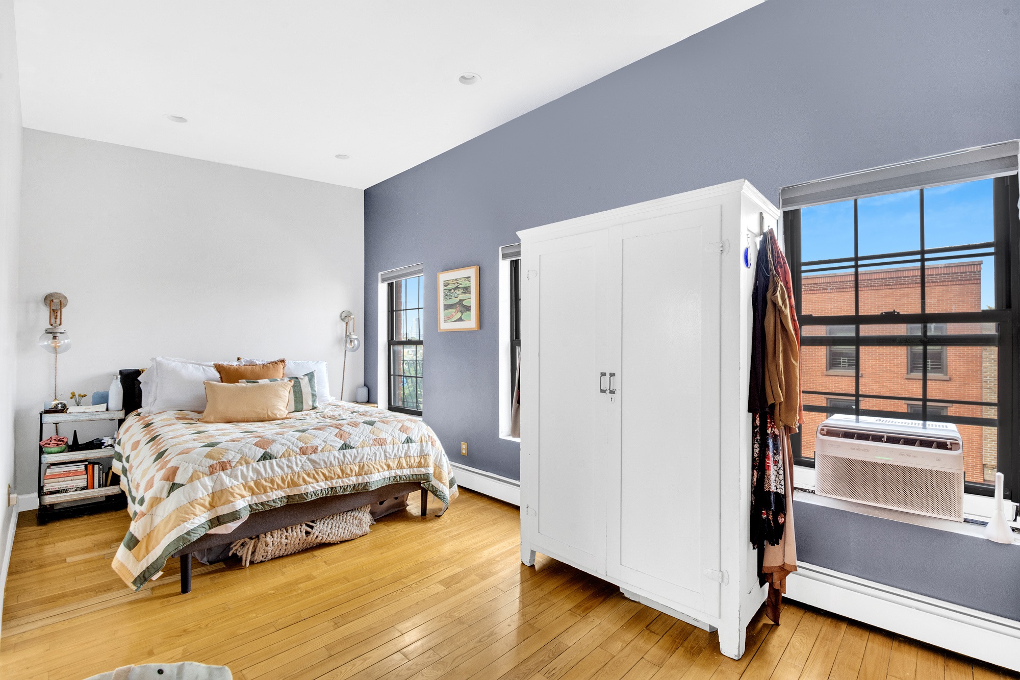 10 Carroll Street Brooklyn, NY 11231 - Photo 21 of 28 a bedroom with a bed and a large window