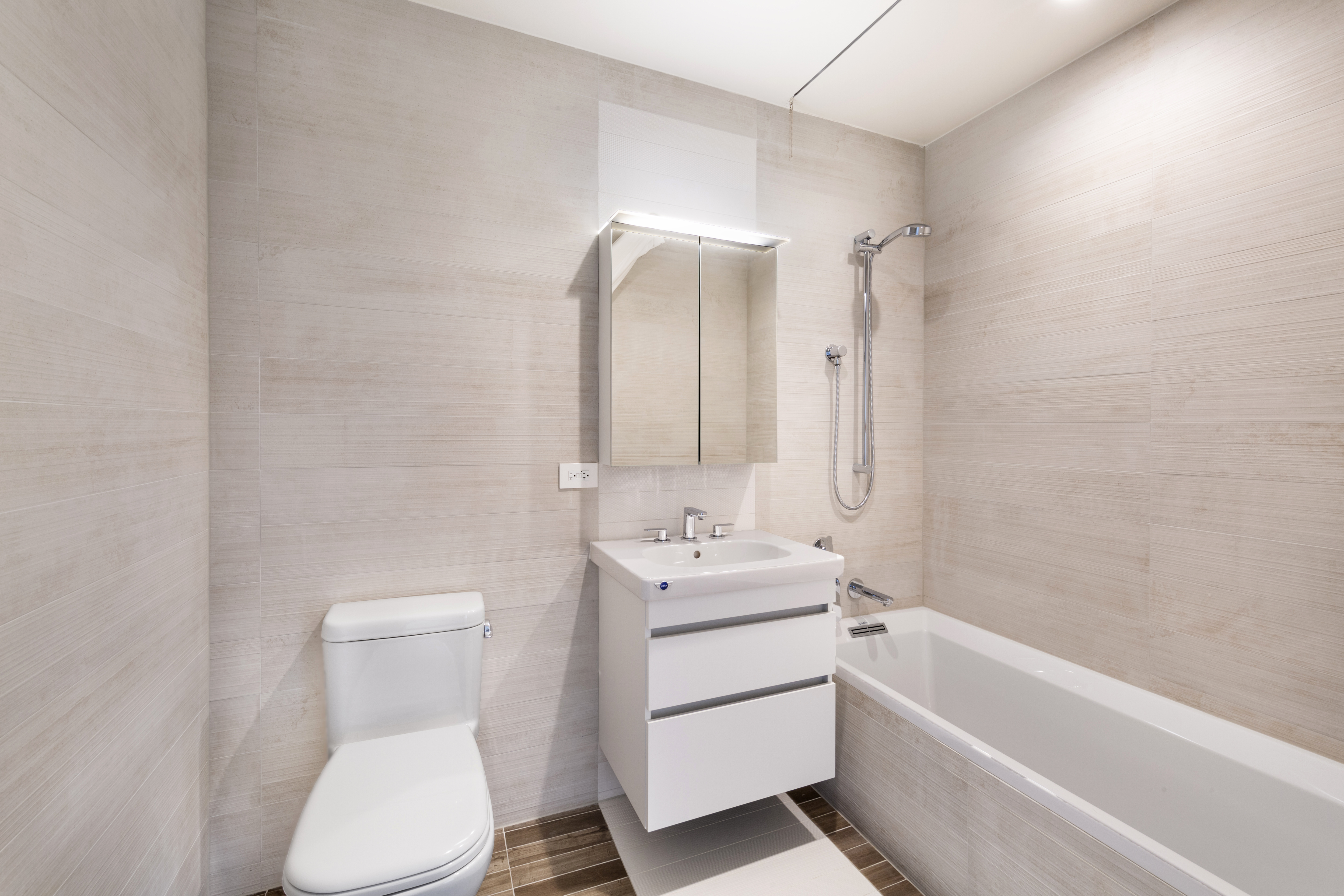 285 West 110th Street, Unit 7B Manhattan, NY 10026 - Photo 8 of 10 a bathroom with a toilet sink and mirror