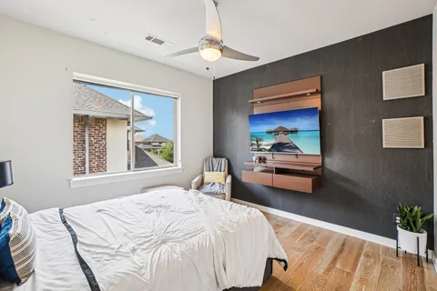a bedroom with furniture and a bed
