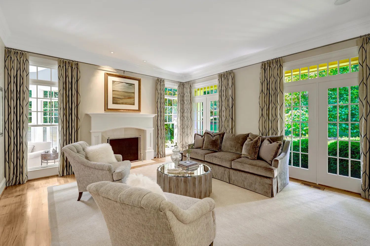a living room with furniture fireplace and a flat screen tv
