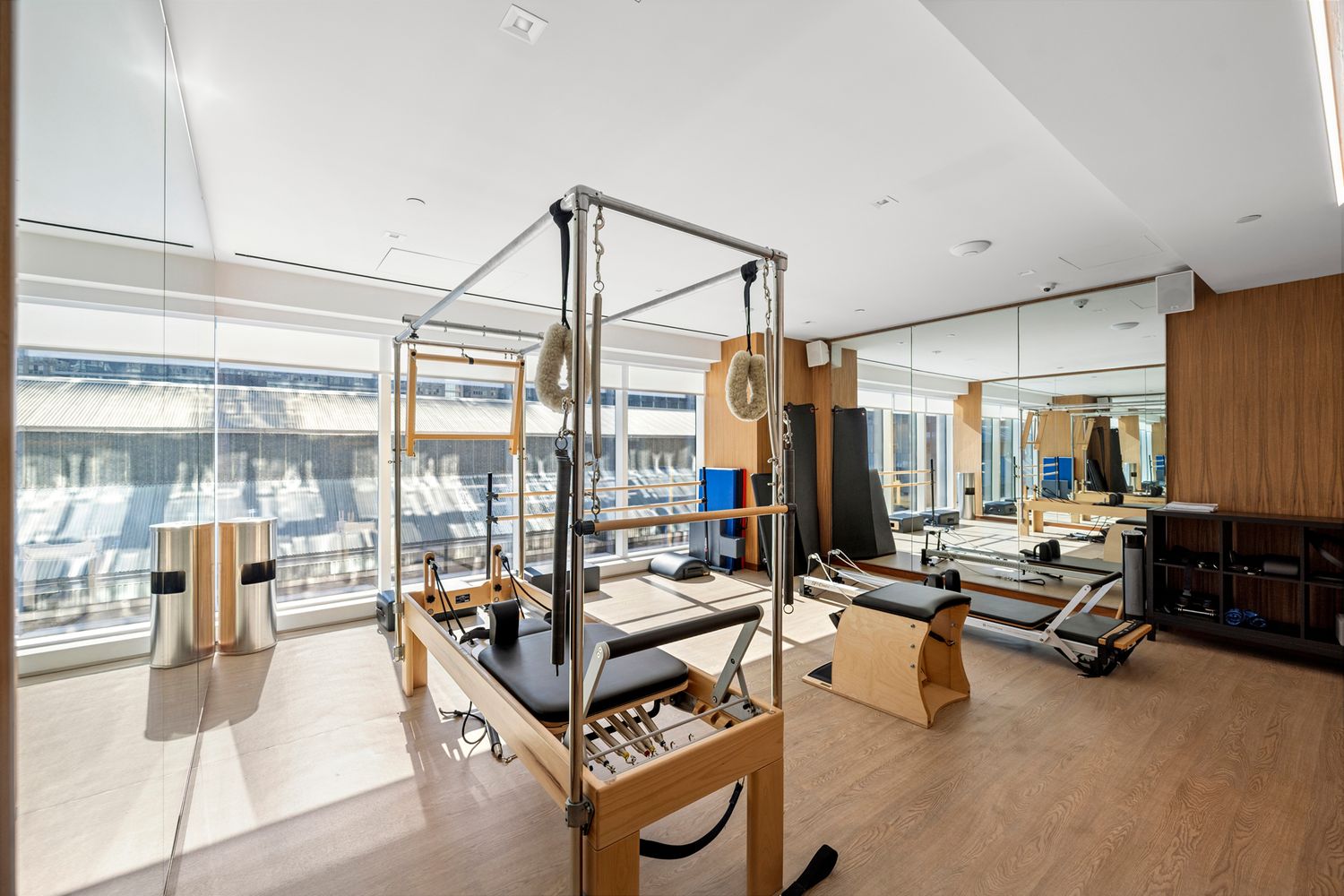 a living room with furniture gym equipment