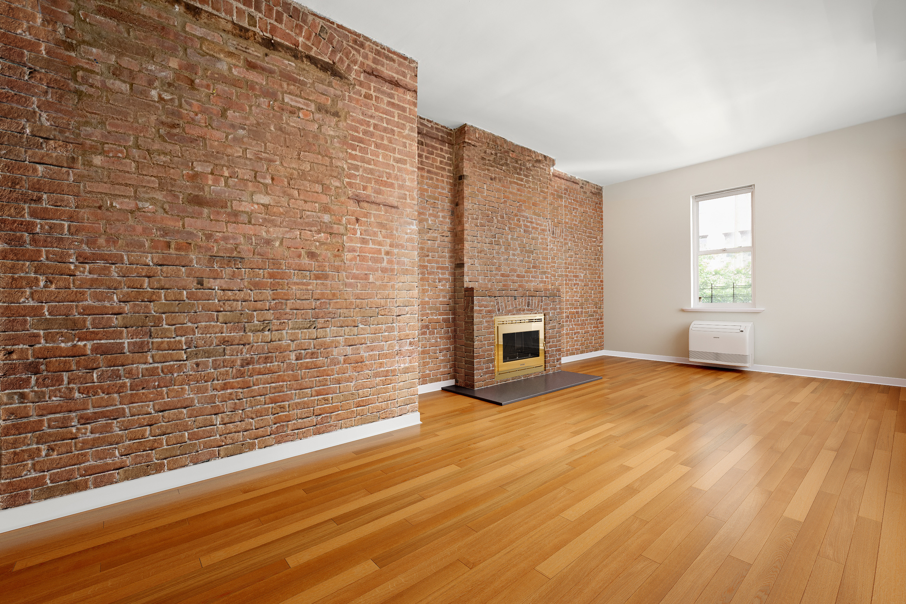 305 West 55th Street, Unit 2B Manhattan, NY 10019 - Photo 2 of 9 a view of empty room with wooden floor and fireplace