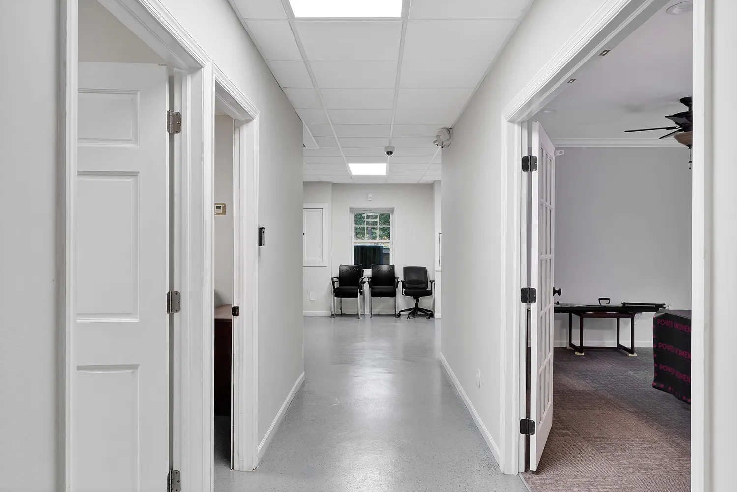 a room with a chair and couch