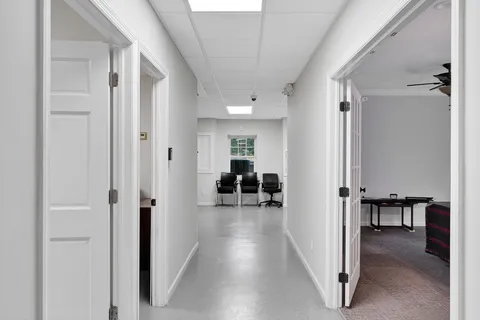 a room with a chair and couch