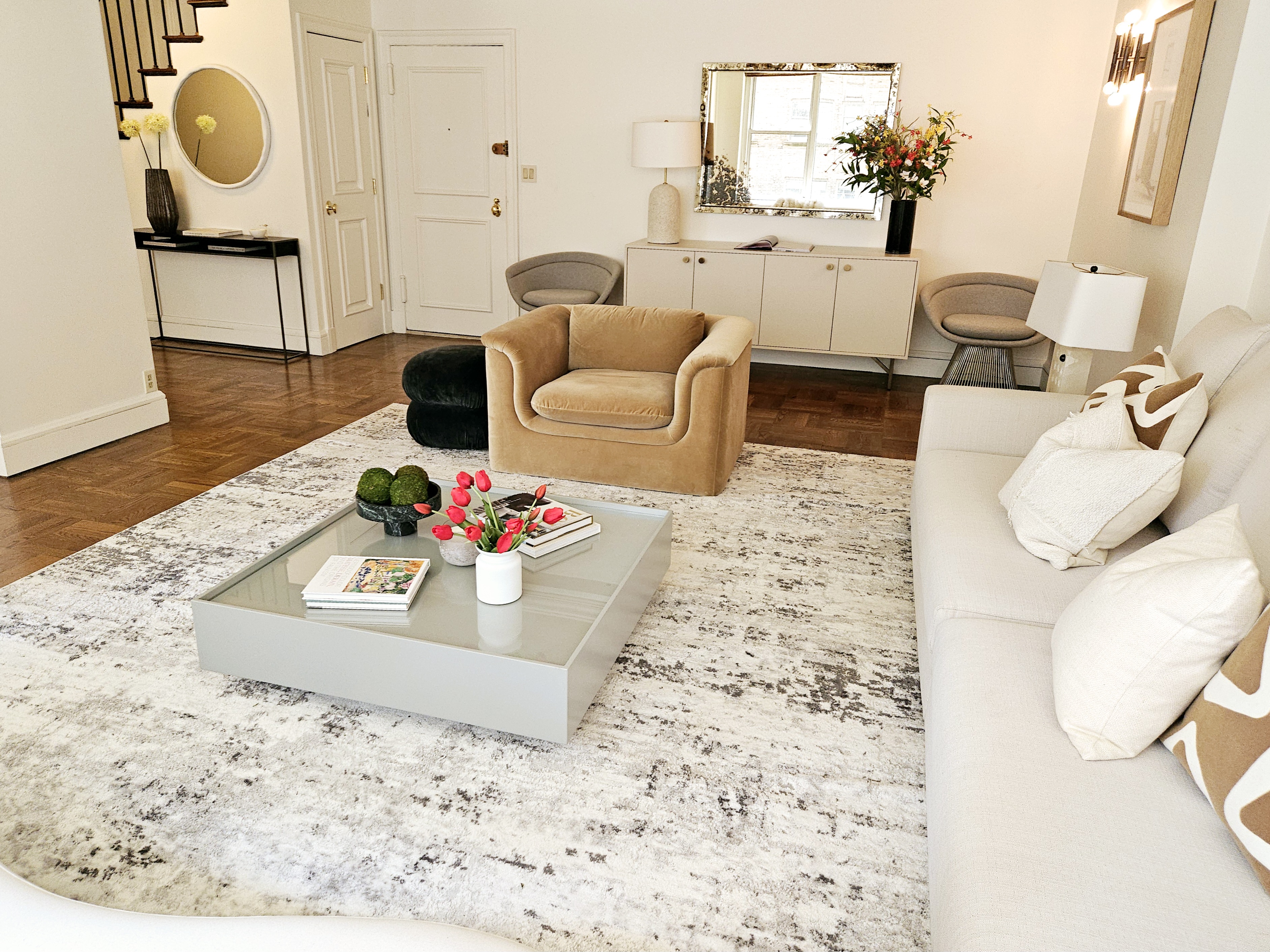 169 East 69th Street, Unit 7/8 B Manhattan, NY 10021 - Photo 3 of 30 a living room with furniture and a rug