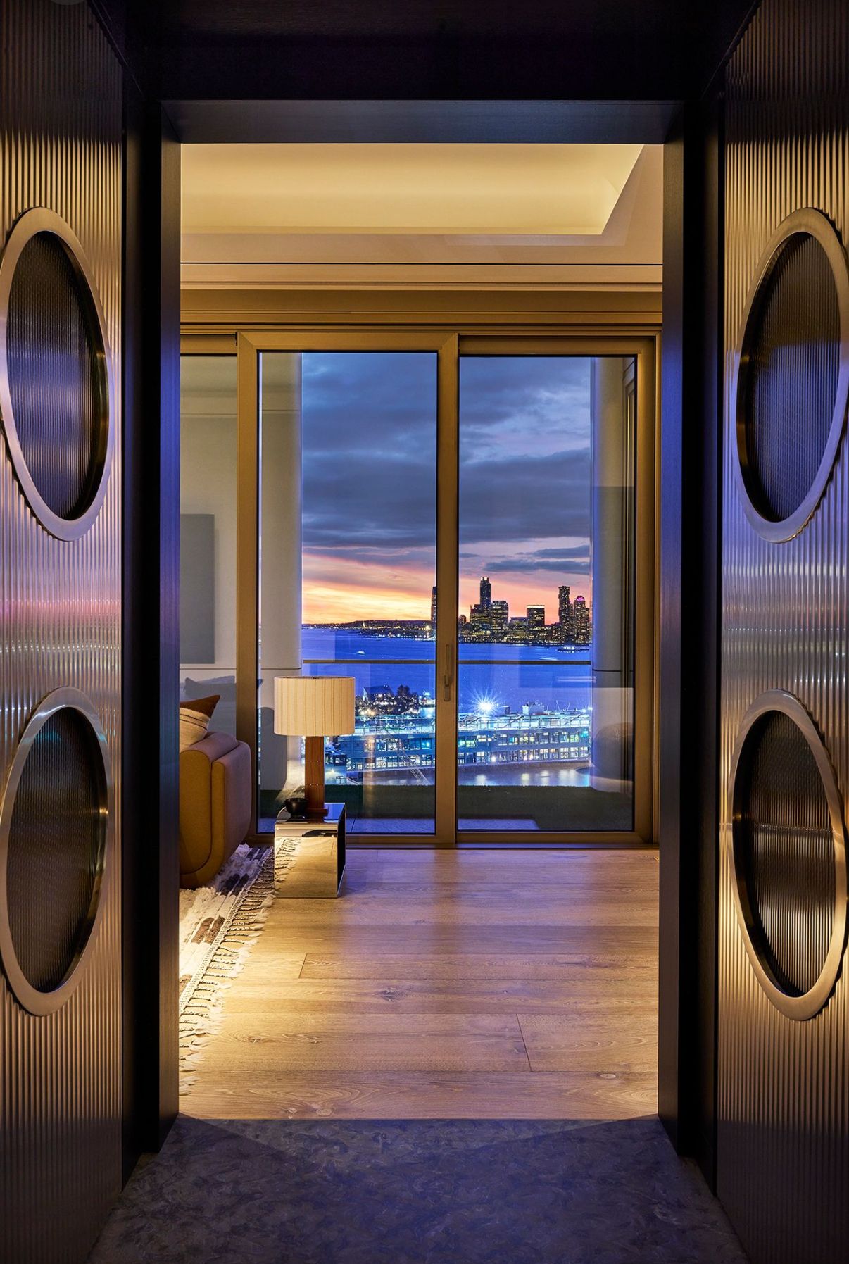 551 West 21st Street, Unit PH Manhattan, NY 10011 - Photo 12 of 51 a living room with furniture and a fireplace