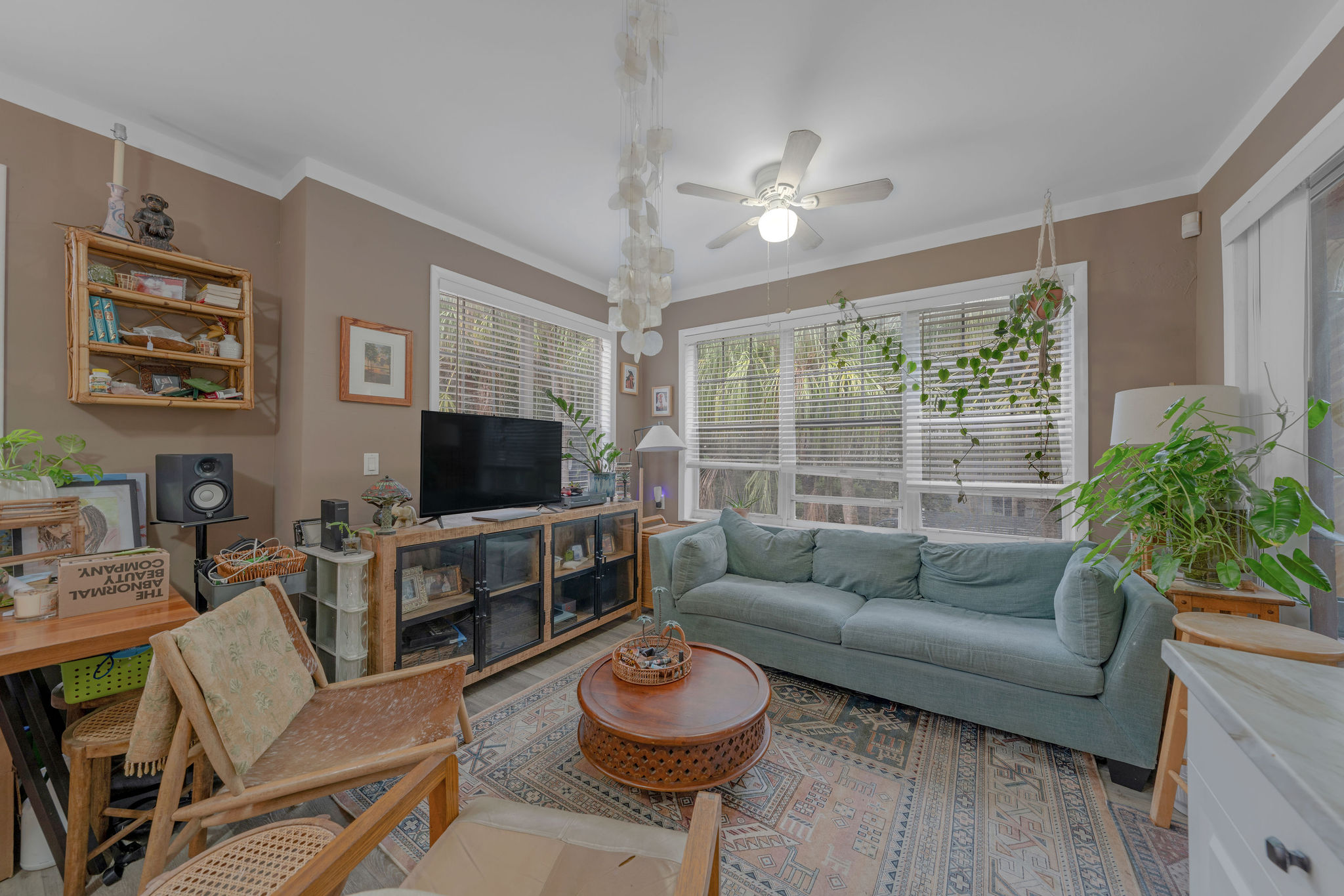 735-745 Meridian Avenue Miami Beach, FL 33139 - Photo 6 of 62 a living room with furniture and a flat screen tv
