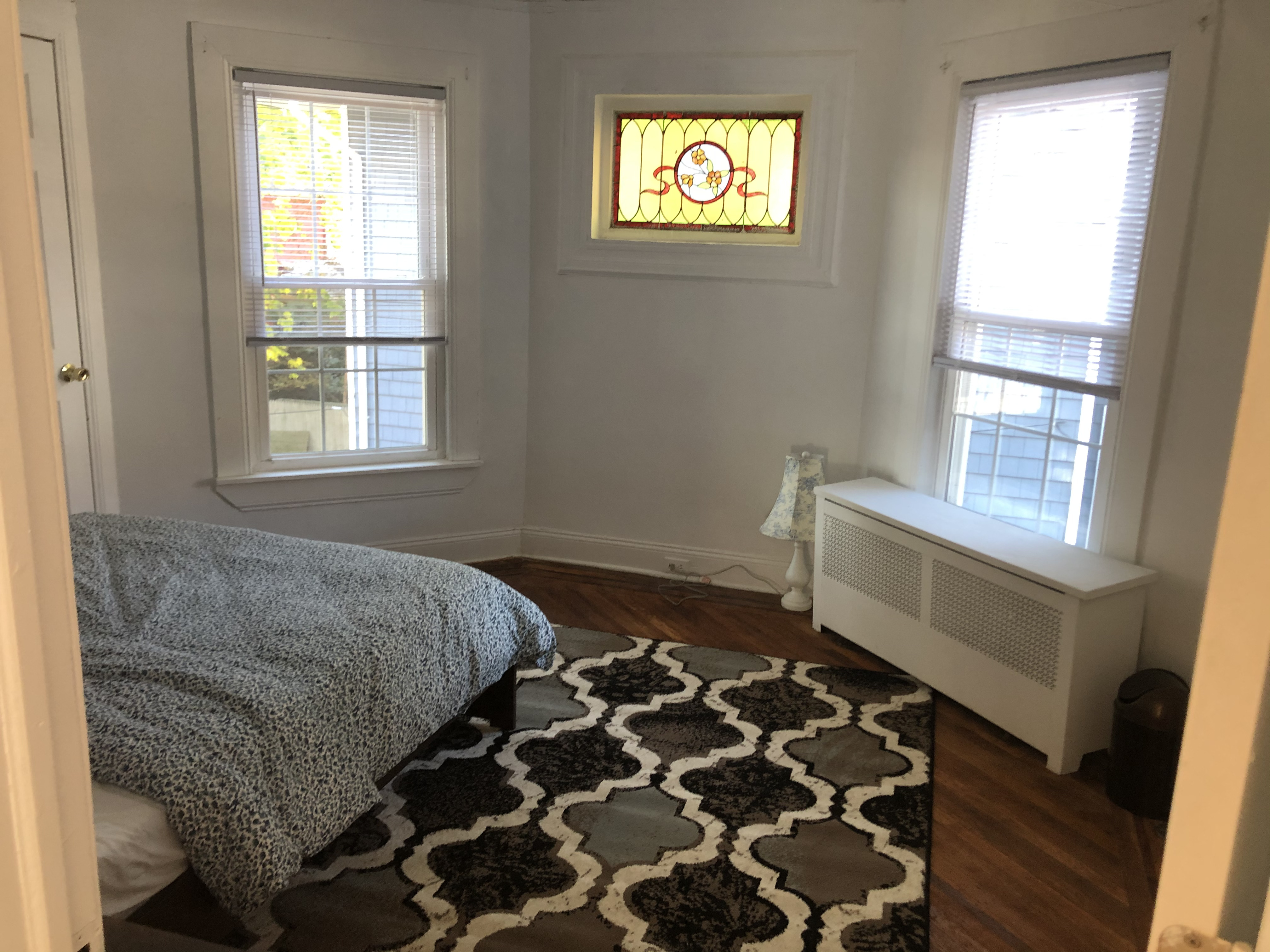 1112 Beverley Road Brooklyn, NY 11218 - Photo 26 of 53 a bedroom with a bed and a window