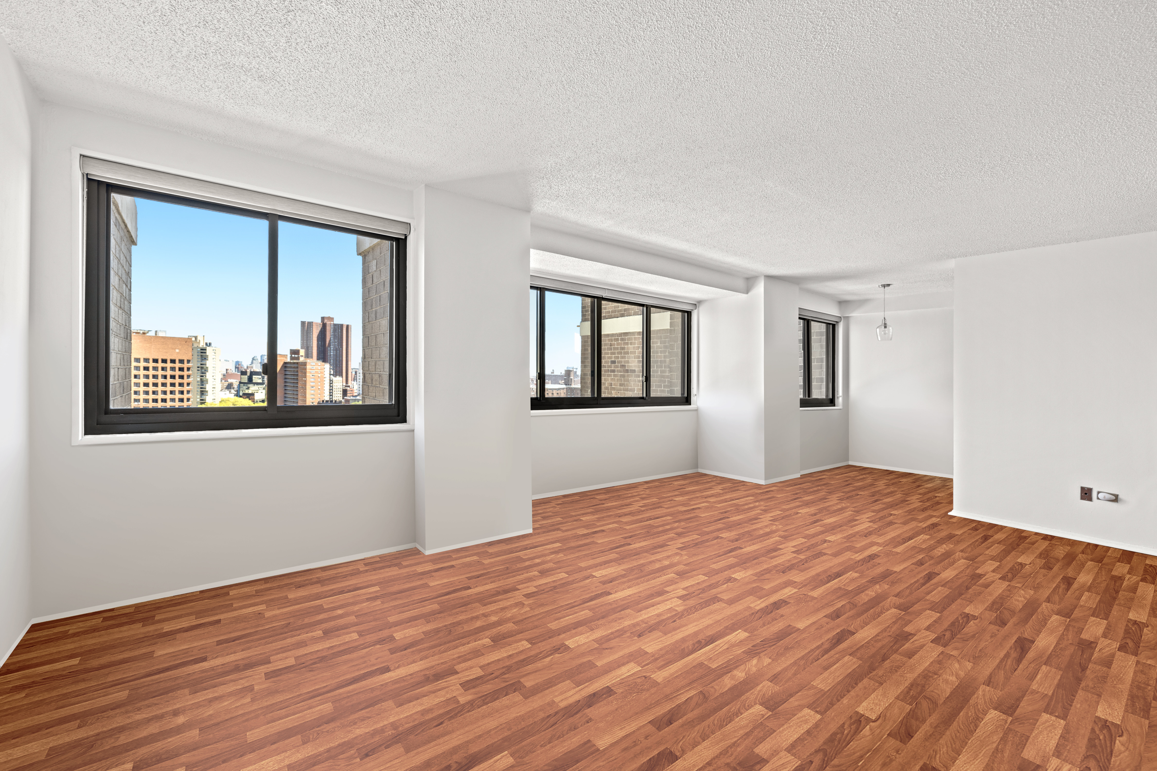 90 Gold Street, Unit 21G Manhattan, NY 10038 - Photo 6 of 9 a bedroom with a bed and a window