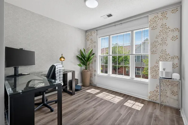 a view of a livingroom with furniture and a couch