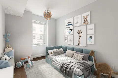 a bedroom with a bed and window