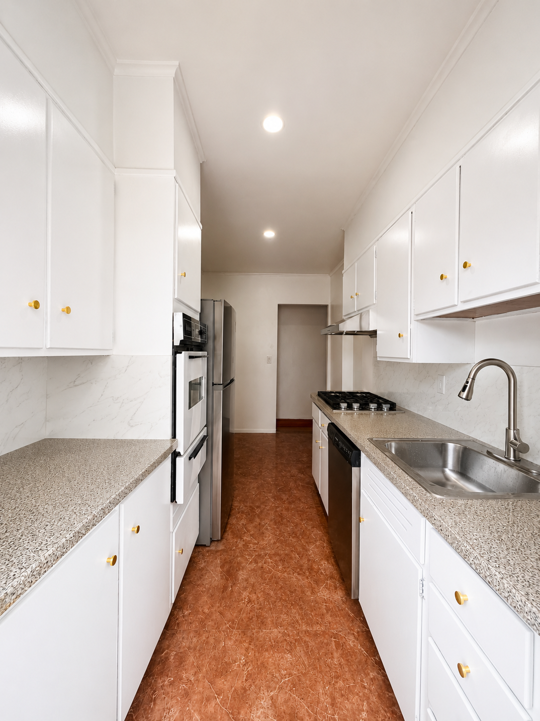 63-33 Haring Street, Unit 1F Queens, NY 11374 - Photo 6 of 13 a kitchen with stainless steel appliances granite countertop a sink stove and refrigerator