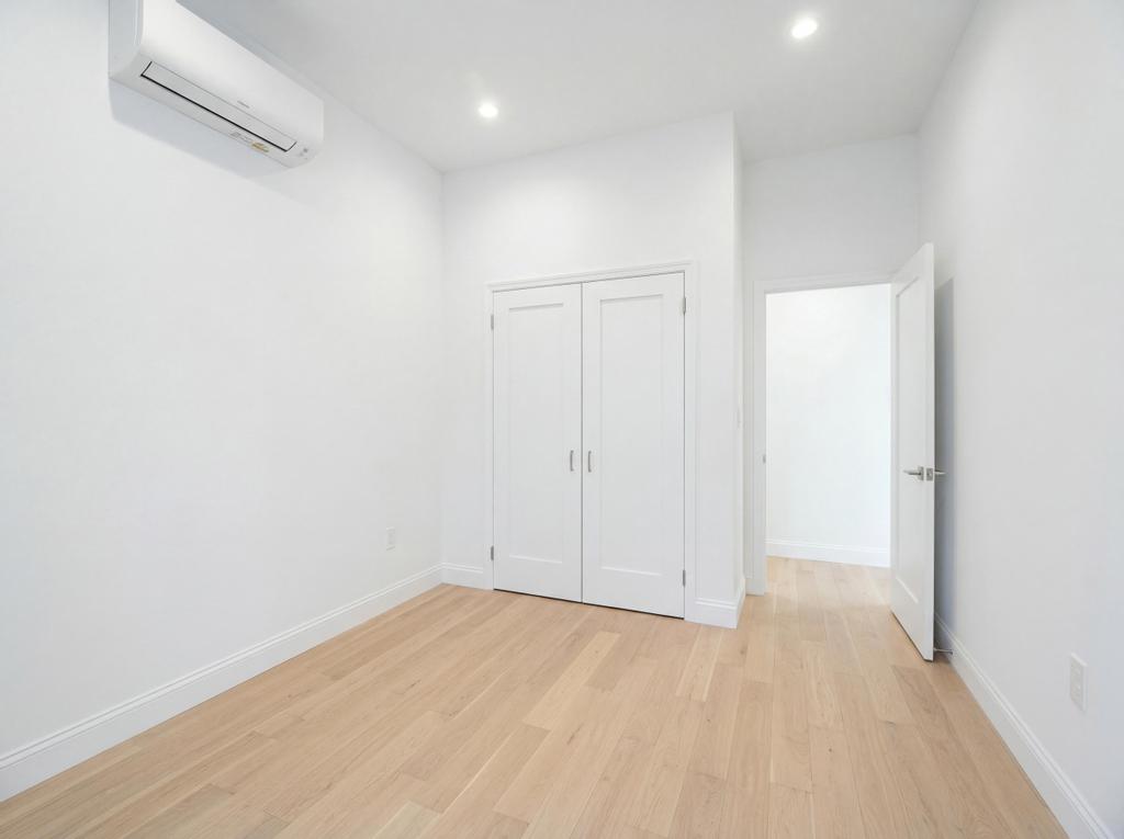 231 East 60th Street, Unit 5 Manhattan, NY 10022 - Photo 9 of 11 a view of an empty room