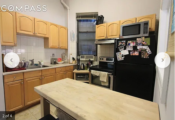 1315 3rd Avenue, Unit 2FN Manhattan, NY 10021 - Photo 4 of 4 a kitchen with stainless steel appliances granite countertop a sink dishwasher stove and refrigerator