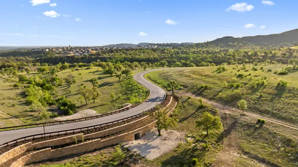 a view of a balcony with an ocean view